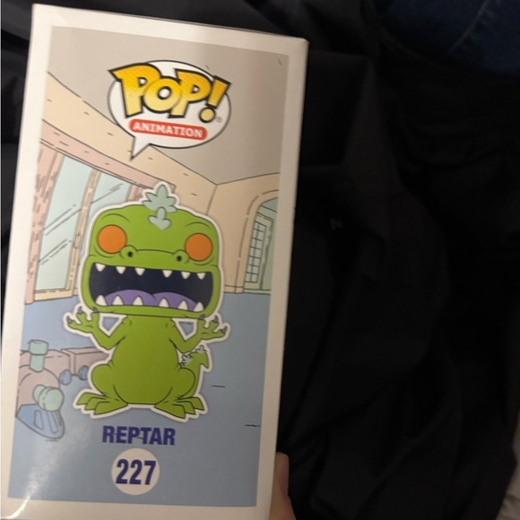 Funko Purple Reptile Figure with Iconic Features - Picture 2 of 2